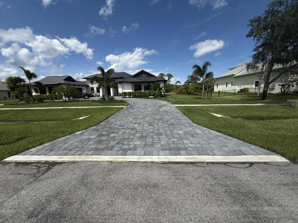 Same paver driveway after cleaning and sealing