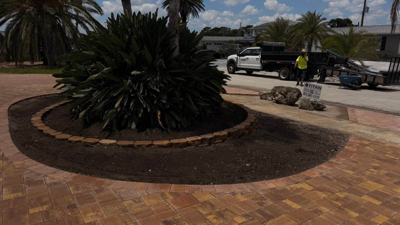 Titan crew installing the teardrop driveway